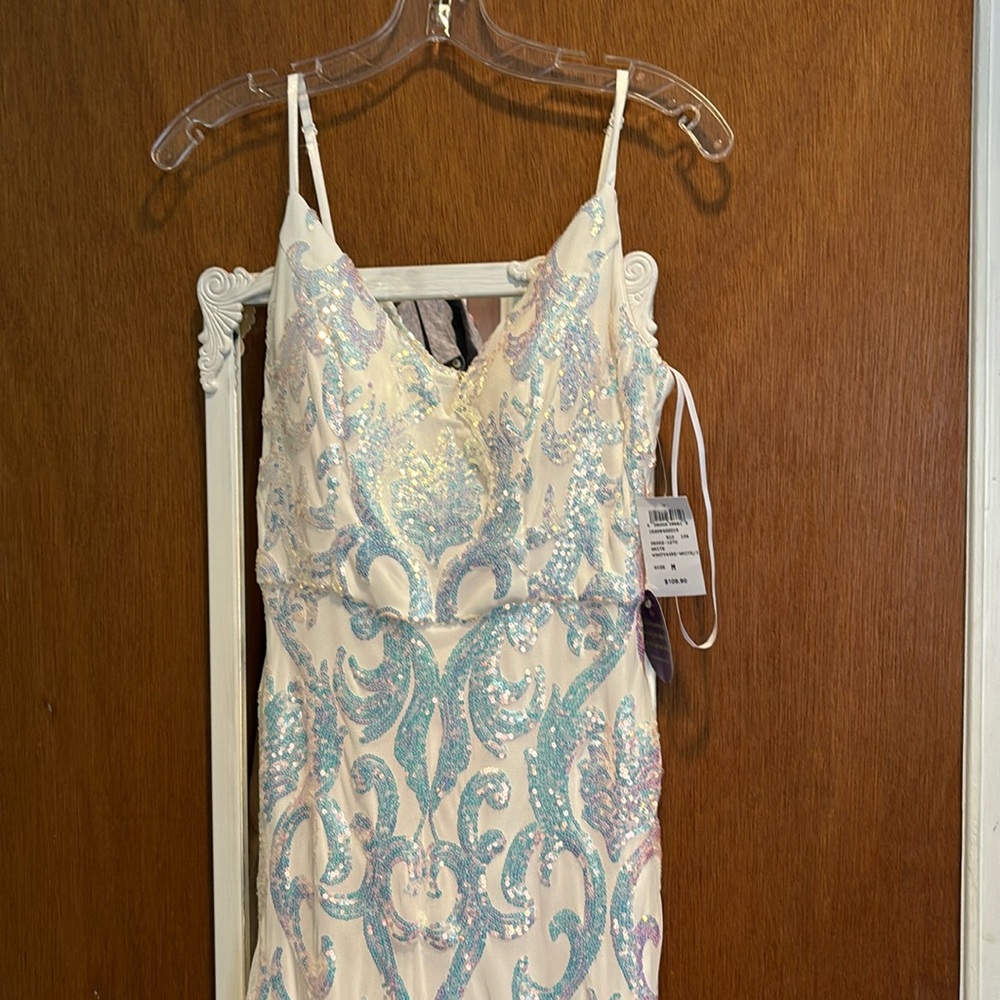 Windsor long dress.With pale blue and purple sequins design. Brand new Medium